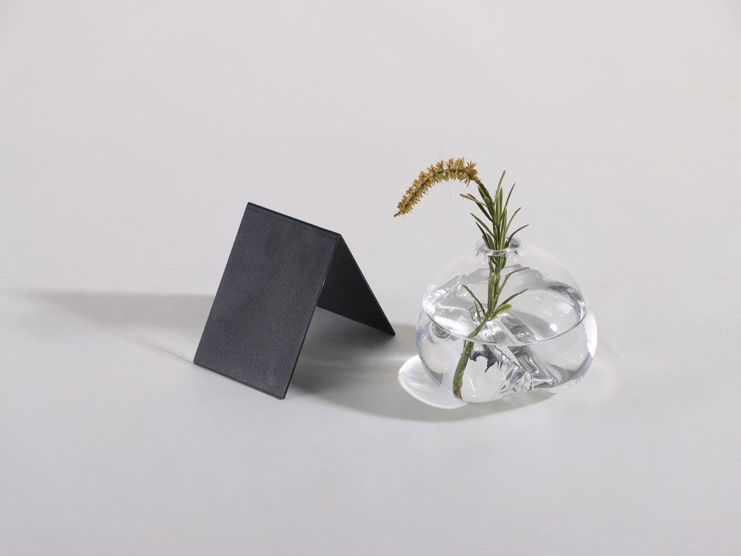 IRREGULAR GLASS VASE WITH METAL STAND
